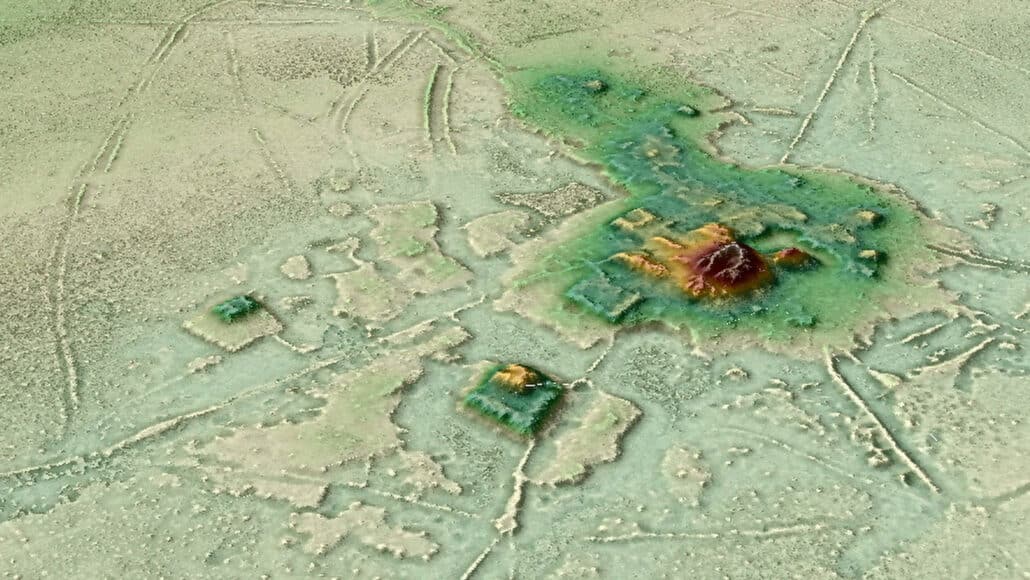 Esta captura de tela de uma animação 3-D baseada em lidar mostra a paisagem urbana de Cotoca, um local primário em uma antiga rede urbana amazônica. Calçadas elevadas irradiam em diferentes direções de montículos de plataforma, pirâmides e outras estruturas. (Créditos: H. Prümers/Instituto Arqueológico Alemão)