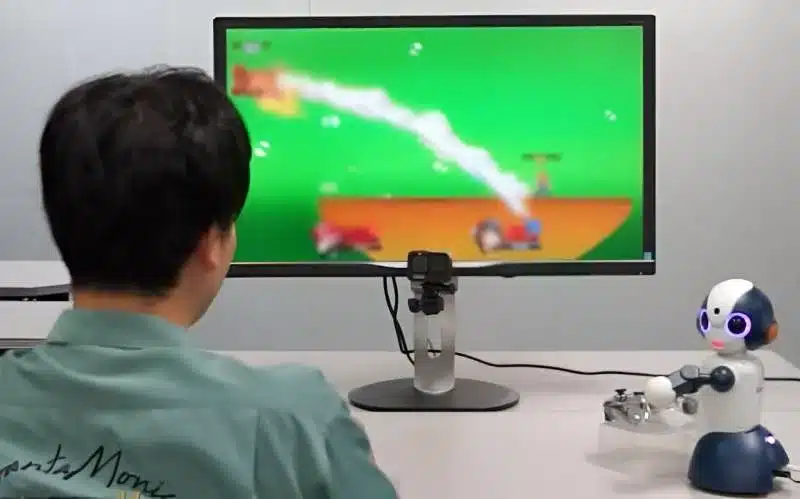 Um robô que pode jogar videogame com humanos